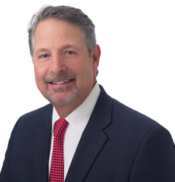 A picture of Joel Plauche in a professional attire