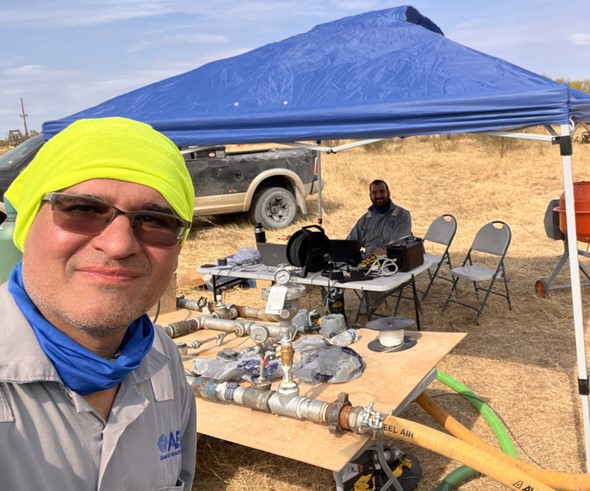 Dr. Mahdi Haddad (co-PI) and Kemal Ozel (Student research scholar) at the data-acquisition and pump station during the final field test.